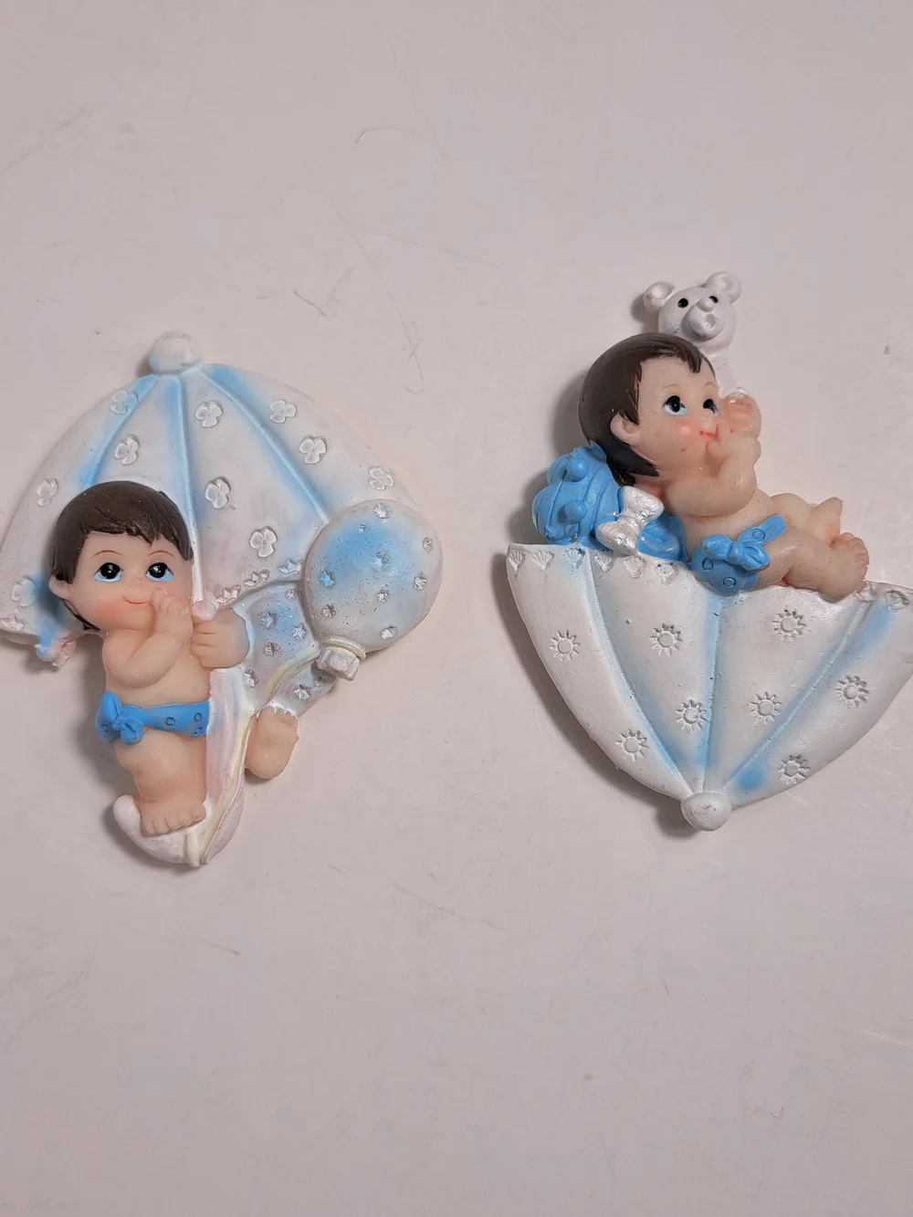 Blue Baby Ceramic Figurines with a Magnet on the back. Great for Baby Shower